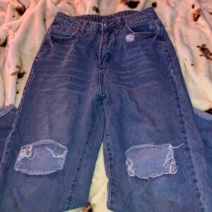 high waisted blue ripped jeans